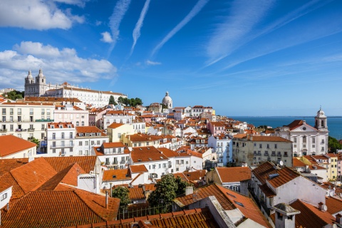 Panoramic view of the red rooftops and white buildings of Lisbon Portugal