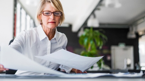 woman reviewing employer burden quotes