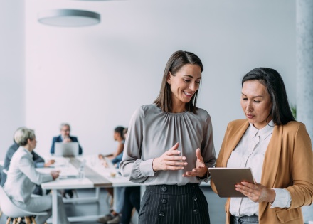 Colleagues discussing how to get work authorization in Mauritania