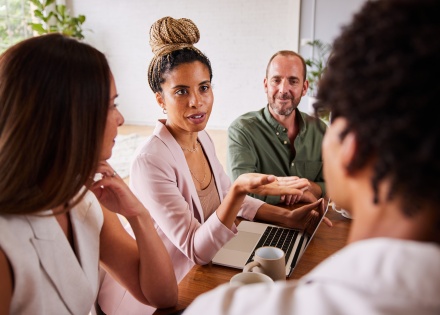 Team discussing CSRD Impact for Managing EU Talent