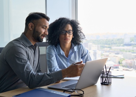 HR team members discussing Turkmenistan work visas