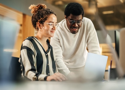 HR employees discussing how to switch EOR providers