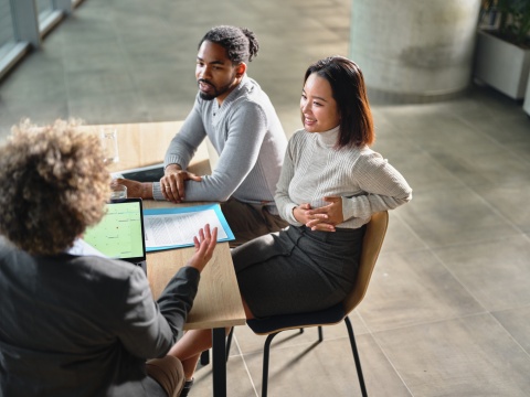 HR team members discussing work visa in the United Kingdom