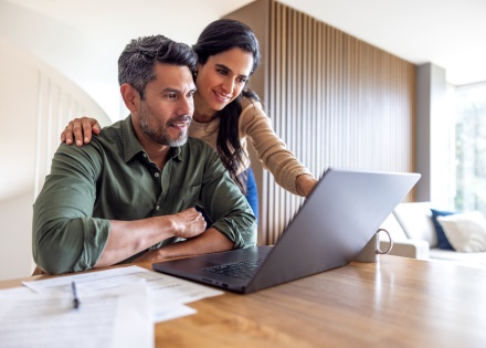 HR team members going over a hiring need to knows checklist