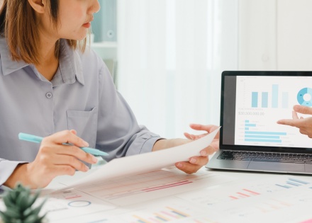 Business people meeting in an office to discuss business plans and goals.