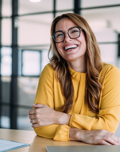 Woman learning the options of Pebl equity management services in a business setting.