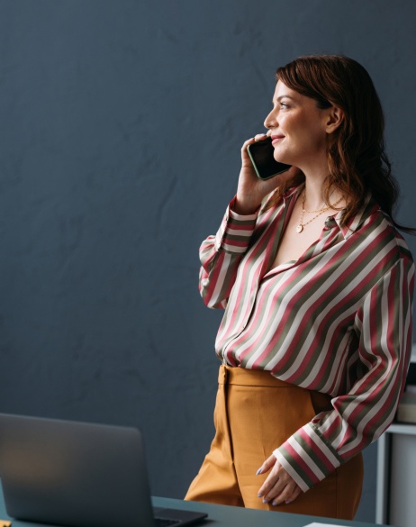 Global HR manager discussing global equity compensation on the phone