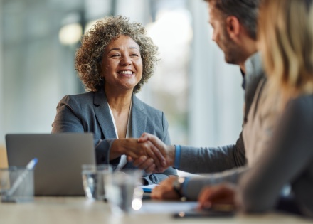 Global HR team meeting to discuss employee bonuses around the world