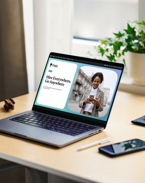 Hire Everywhere, Go Anywhere guide displayed on a laptop.