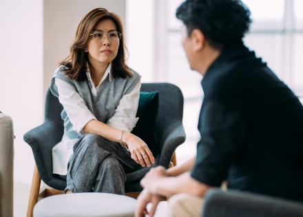 Global HR team members discussing Vietnam work visa