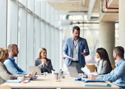 Global HR team discussing average working hours by country