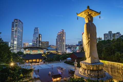 View from a temple in Korea of skyscrapers at dusk