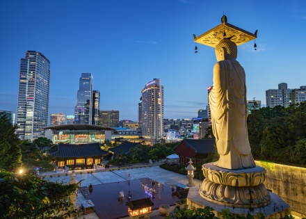 View from a temple in Korea of skyscrapers at dusk