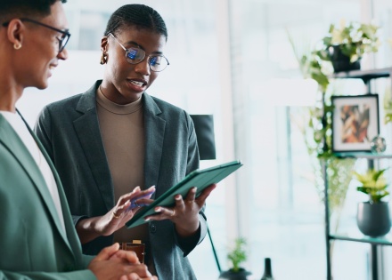 Colleagues discussing hard skills versus soft skills at work