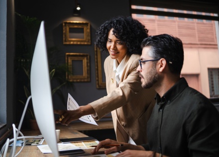 Global HR managers discussing payroll tax in Ghana