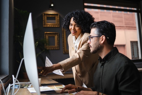 Global HR managers discussing payroll tax in Ghana