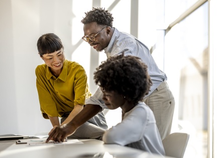 Global HR team discussing how to hire in Mozambique