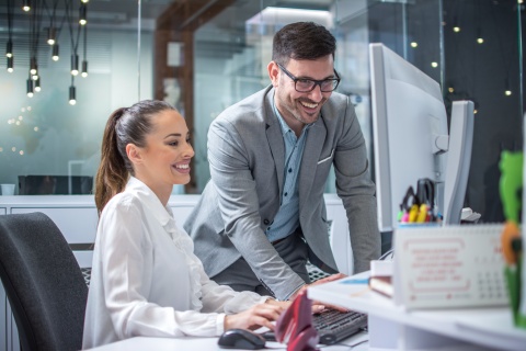 Global HR managers discussing payroll tax in Trinidad and Tobago