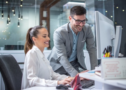 Global HR managers discussing payroll tax in Trinidad and Tobago