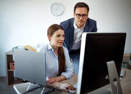 Global HR managers researching payroll tax in Benin together