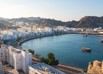Aerial view of Muscat Oman surrounded by mountains