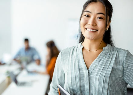 Female professional smiling at camera