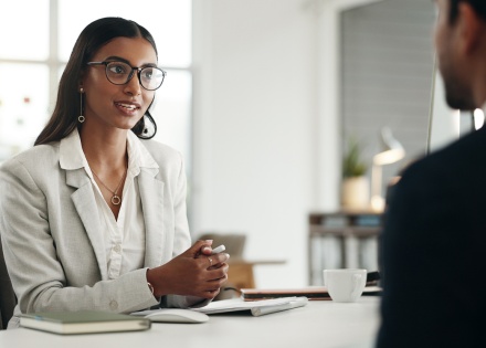HR team talking over how to hire in the Bahamas