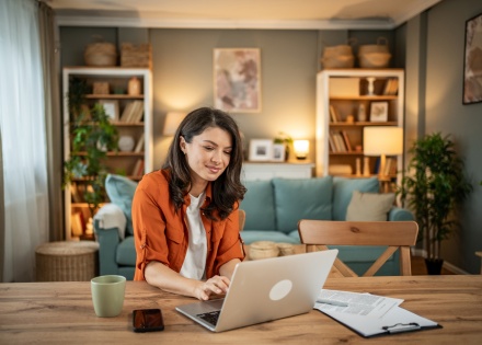 HR manager reviewing temporary remote work request forms