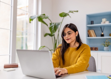 Global hiring manager reading about how to hire in Guinea