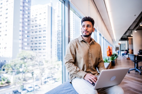 Global hiring manager researching how to hire in Guyana